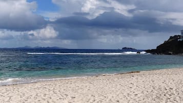 On the beach, sun loungers, beach towels