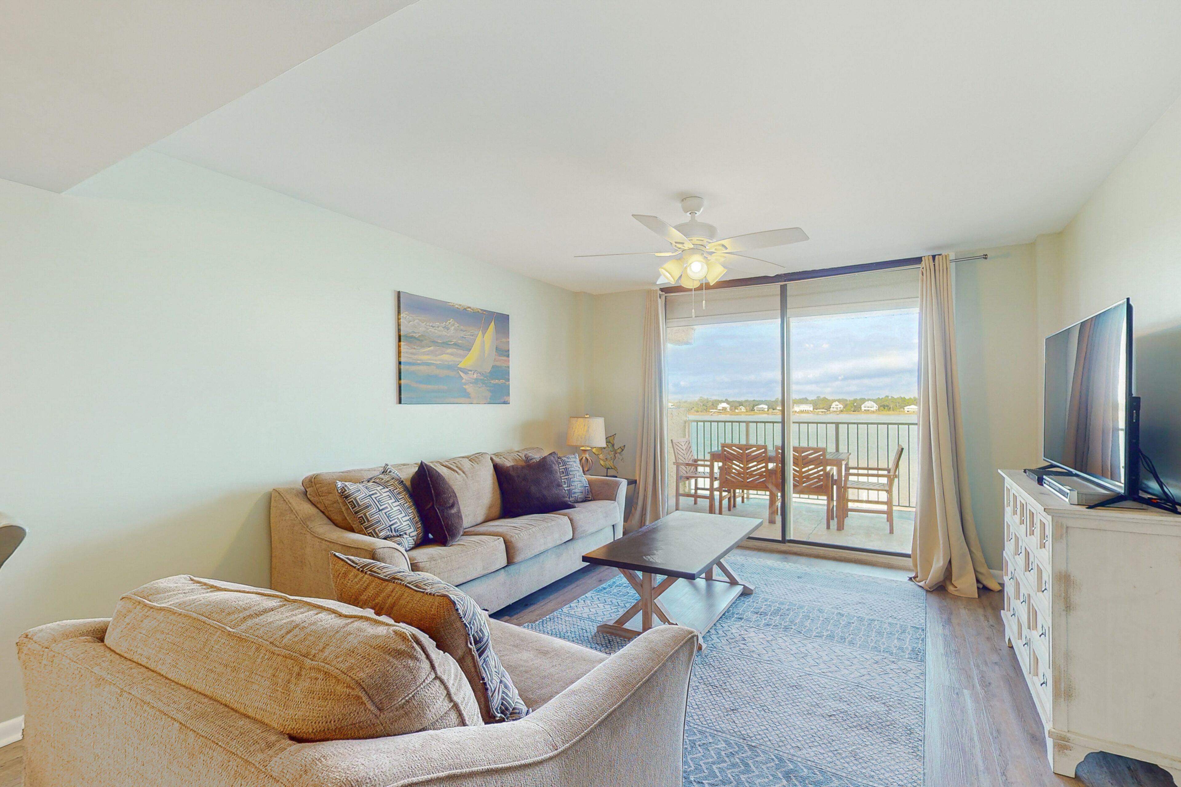 Gorgeous waterfront condo with pool, balcony, grill & washer/dryer