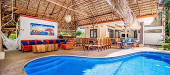 Airy oasis with a grand outdoor space, private pool, & shared tennis court