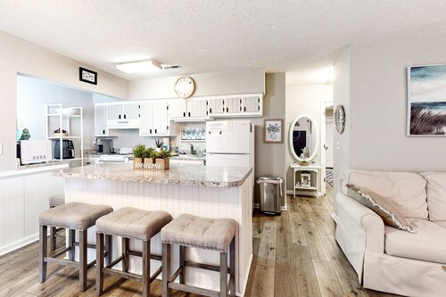 Dog-friendly condo with ocean views, large deck, washer/dryer & central AC