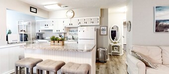 Dog-friendly condo with ocean views, large deck, washer/dryer & central AC