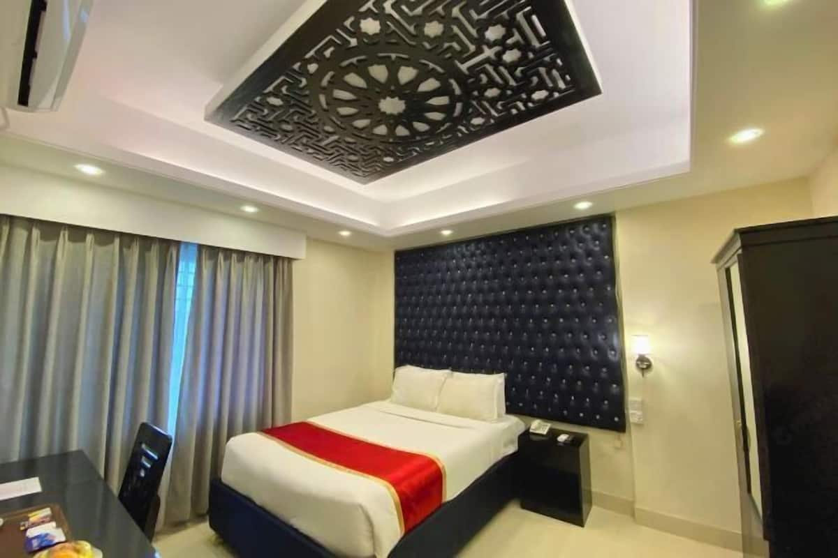 Premium bedding, down comforters, memory foam beds, minibar