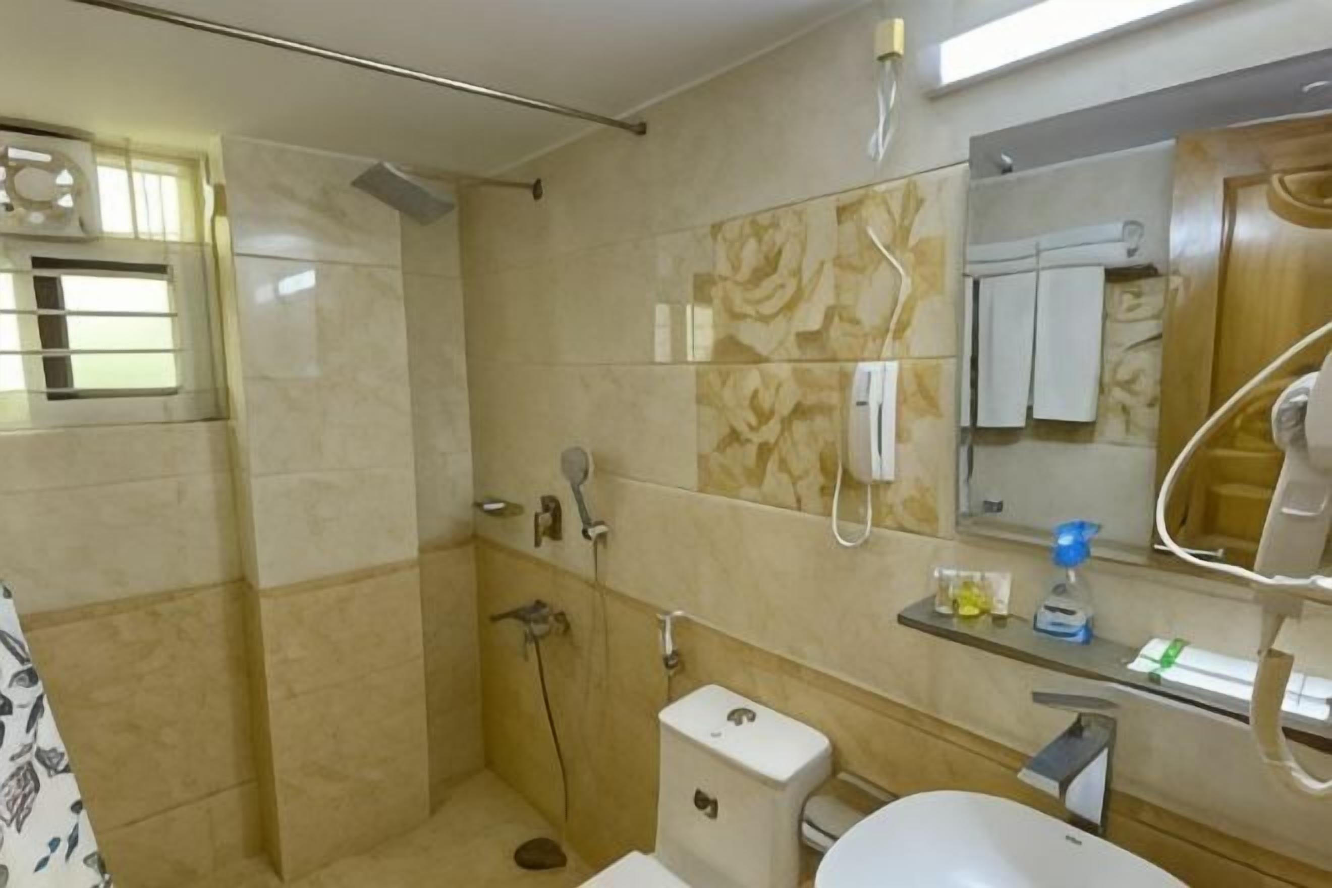 Bathroom | Shower, free toiletries, hair dryer, towels