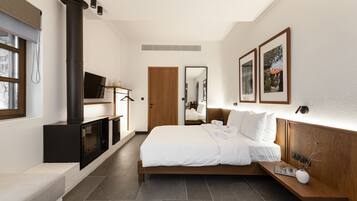 Junior Suite with Fireplace - Mountain & Sea View | Premium bedding, down duvets, minibar, in-room safe