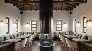 Breakfast, lunch, dinner served; local cuisine, al fresco dining