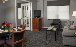 TV, fireplace, books, computer monitors