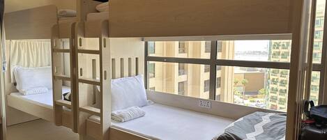 Desk, laptop workspace, blackout drapes, iron/ironing board