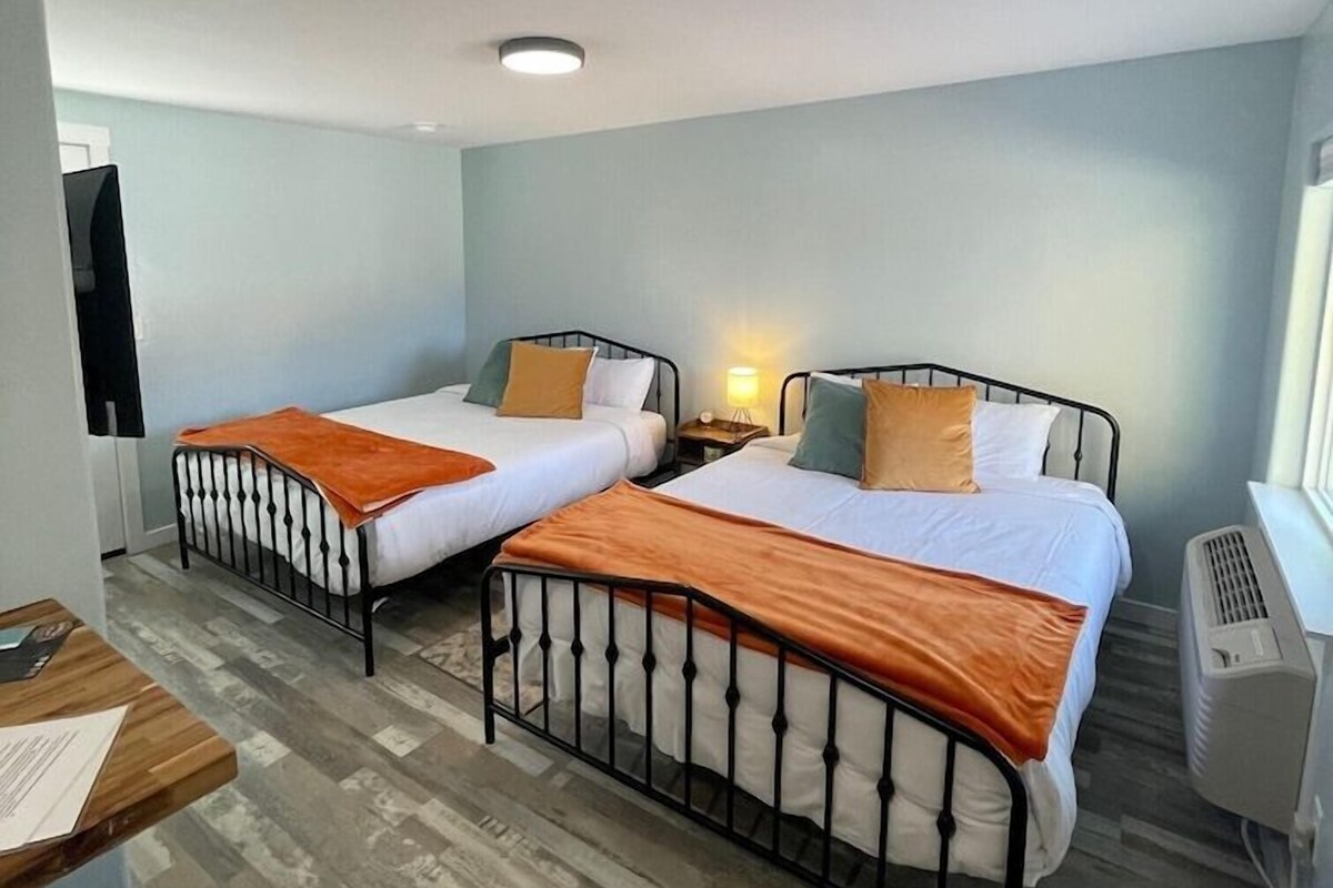 Premium bedding, down duvets, memory-foam beds, desk