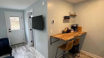 Mini-fridge, microwave, coffee/tea maker, highchair