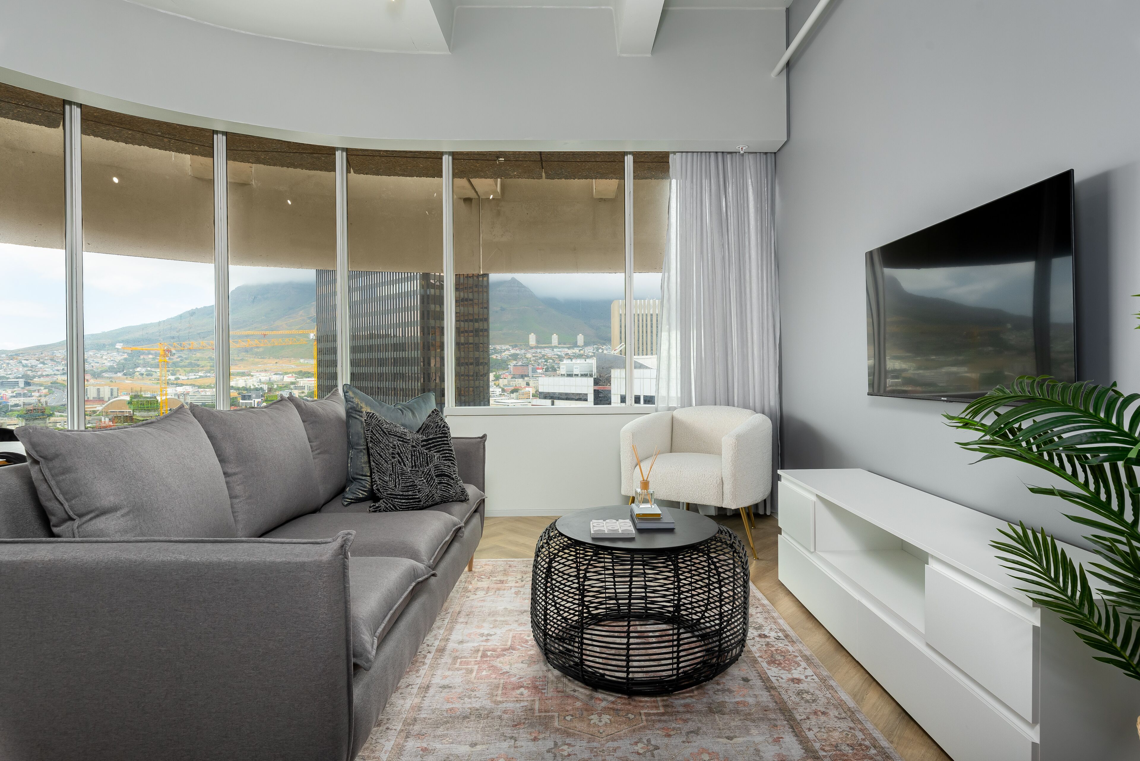 City Apartment | Living area | 40-inch flat-screen TV with cable channels, TV, Netflix