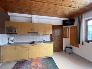 Fridge, microwave, toaster, cookware/dishes/utensils