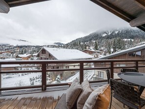 Outdoor dining - Duplex with wellness area, pool and 4 bedrooms in Megève (Megève)
