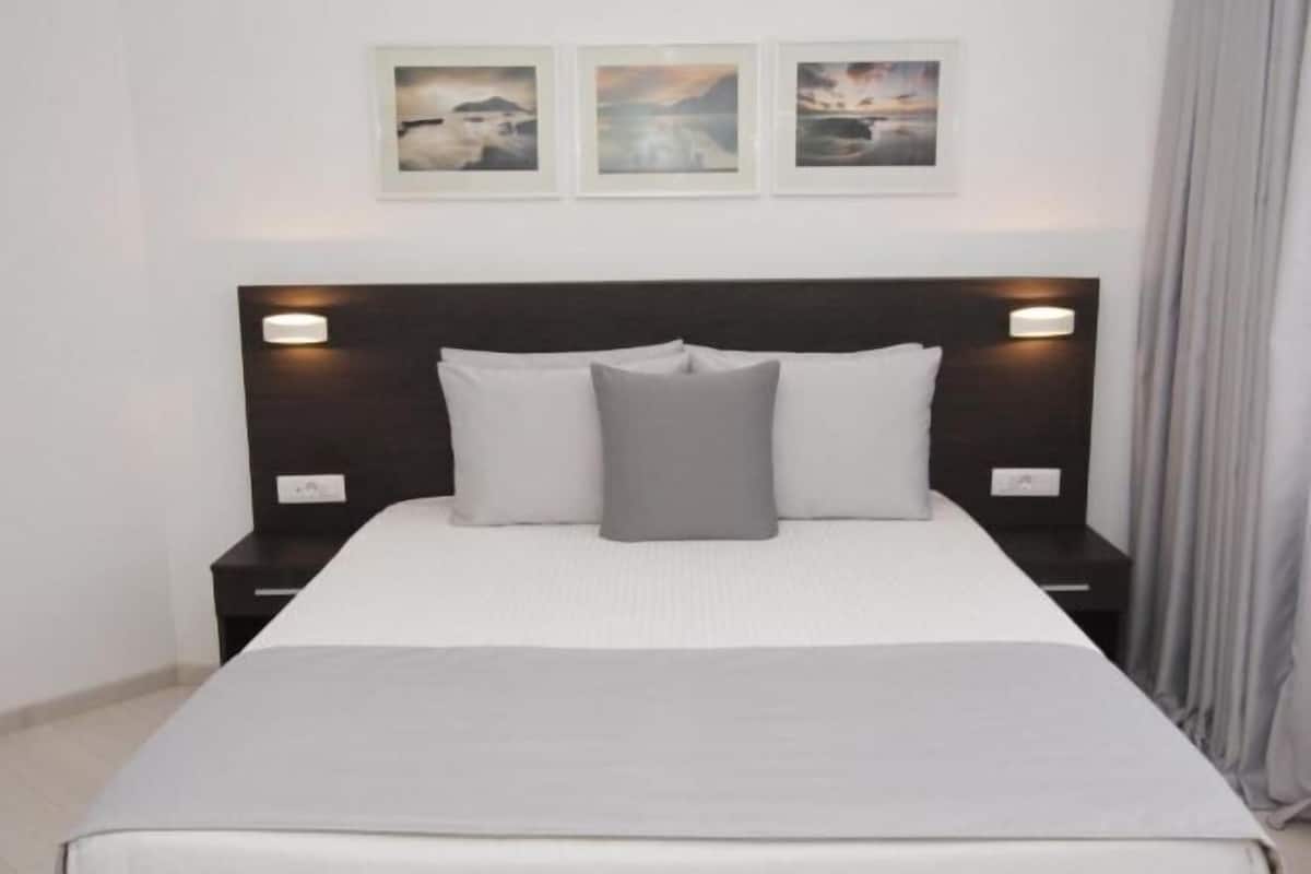 Minibar, in-room safe, blackout curtains, iron/ironing board