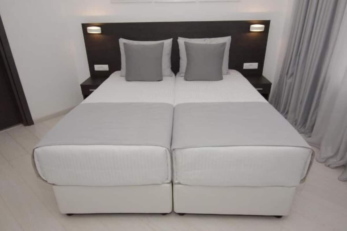 Minibar, in-room safe, blackout curtains, iron/ironing board