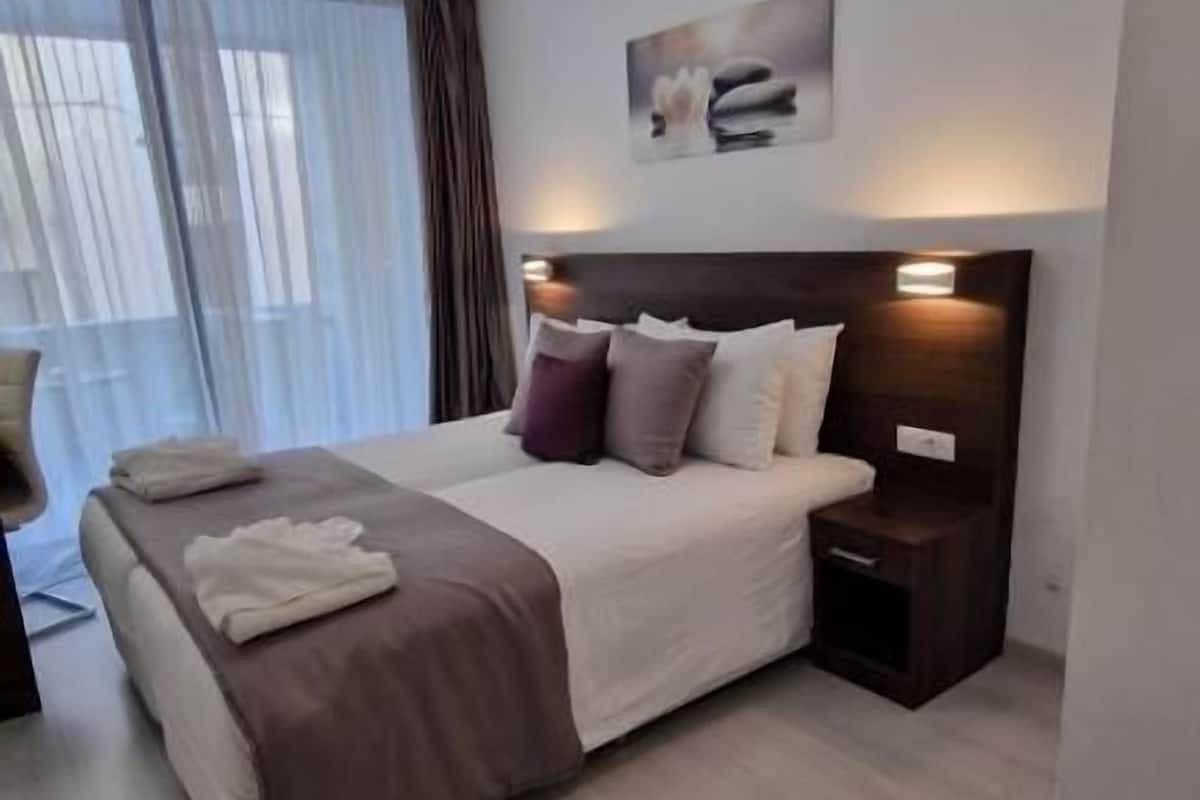 Minibar, in-room safe, blackout curtains, iron/ironing board