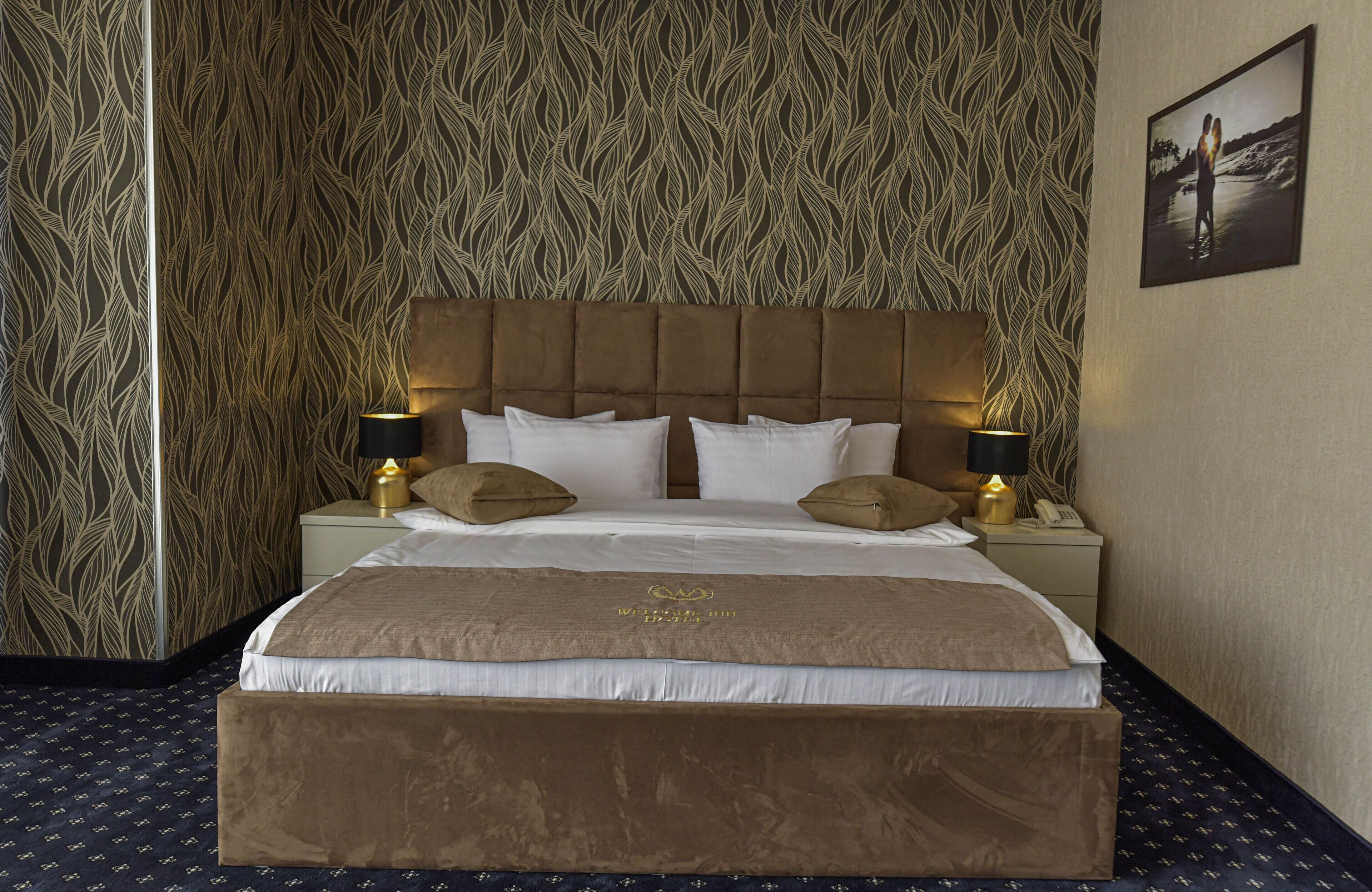 deluxe double room | premium bedding, down duvets, in-room safe, desk