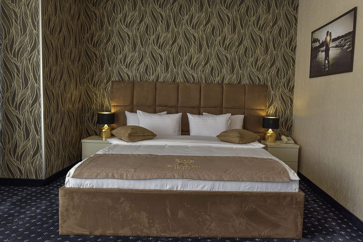 deluxe double room | premium bedding, down duvets, in-room safe, desk
