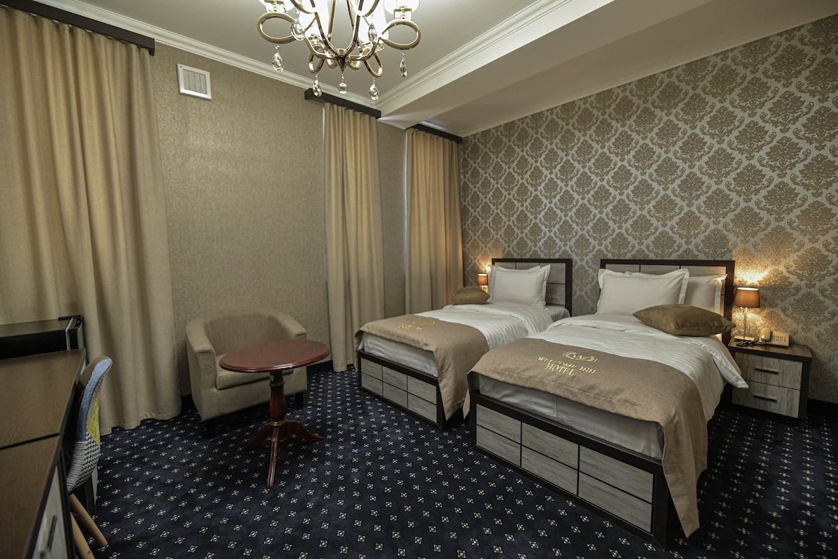 classic double room | premium bedding, down duvets, in-room safe, desk