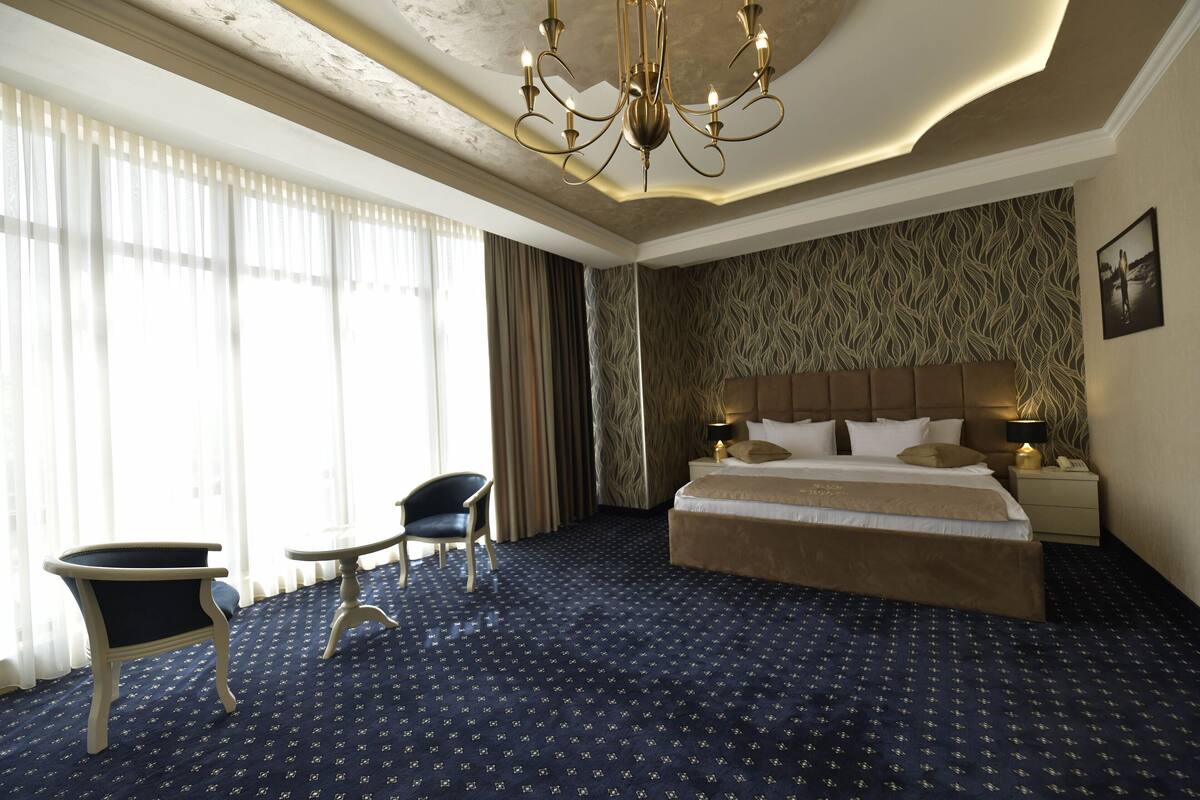 deluxe double room | premium bedding, down duvets, in-room safe, desk