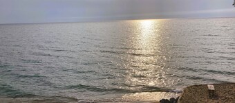 Incredible Lake Michigan views/sunsets. Intimate cottage with sandy beach.