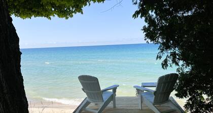 Incredible Lake Michigan views/sunsets. Intimate cottage with sandy beach.