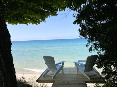 Incredible Lake Michigan views/sunsets. Intimate cottage with sandy beach.