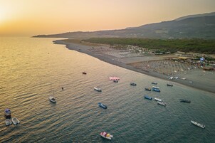 Private beach nearby, white sand, free beach shuttle, sun loungers