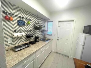 Fridge, microwave, coffee/tea maker, toaster