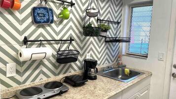 Fridge, microwave, coffee/tea maker, toaster