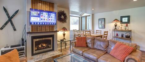 Télévision, cheminée, lecteur de DVD