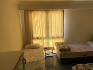 Classic Twin Room, 2 Twin Beds, Shared Bathroom | Free WiFi, bed sheets
