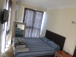 Basic Room, 1 Double Bed, Private Bathroom | Free WiFi, bed sheets