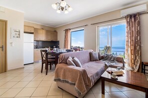 TV, fireplace - Two-Bedroom Apartment 1 with Sea View, Shared Pool & Wi-Fi (Lefkadas)