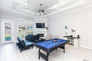 Smart TV, fireplace, books