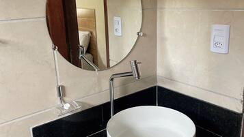 Shower, towels, soap, toilet paper