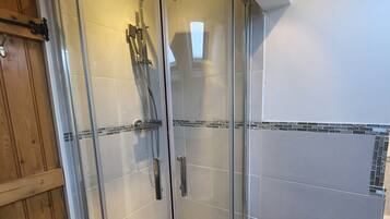 Bathtub, hair dryer, towels, soap