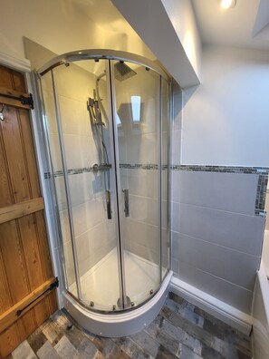 Bathtub, hair dryer, towels, soap