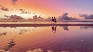 Beach nearby, white sand, beach cabanas, sun loungers
