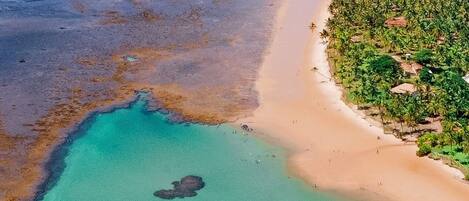 Beach nearby, white sand, beach cabanas, sun-loungers