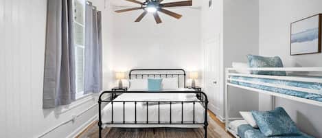 1 bedroom, desk, iron/ironing board, travel crib