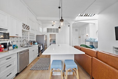 Fridge, microwave, oven, stovetop. Charming Loft with Balcony in Downtown Galveston