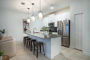 Fridge, microwave, oven, stovetop - Cozy Villa w/ Free Pet Fee Near Disney (Champions Gate)