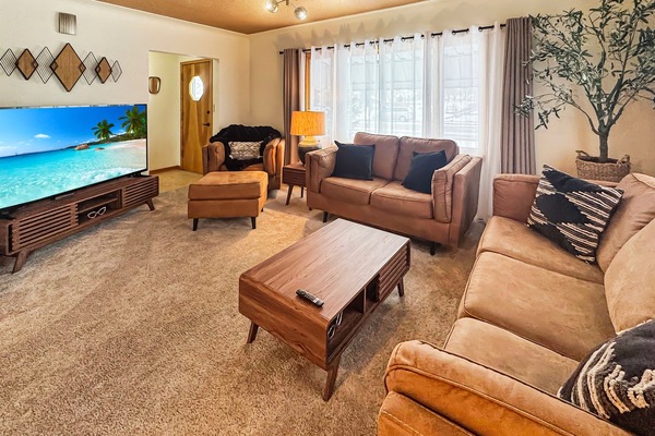 Cozy up on comfortable seating and enjoy the massive 75" screen