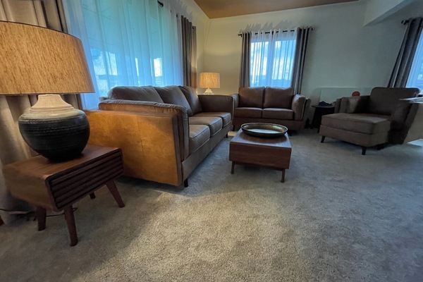 Cozy living room with 75" TV.