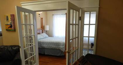 Stylish 2 bedroom 1 bath with riverfront views close to dining and downtown