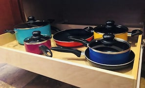 A kitchen drawer with various pots and pans. - Cozy King by Red Rocks & Downtown Denver (Wheat Ridge)