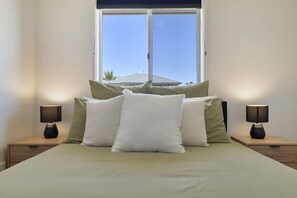 4 bedrooms, iron/ironing board, travel cot, WiFi