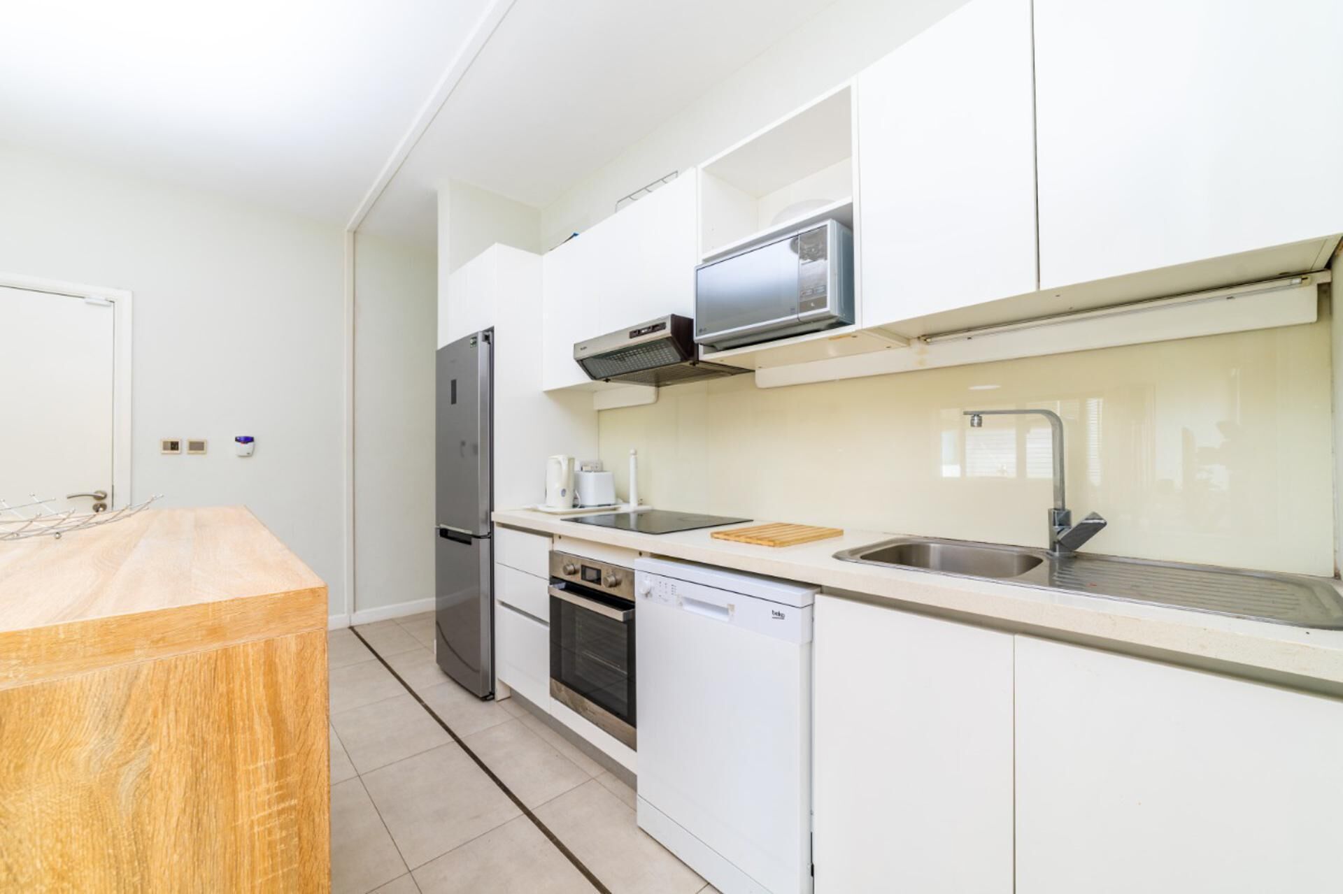 Apartment | Private kitchen | Fridge, microwave, oven, stovetop