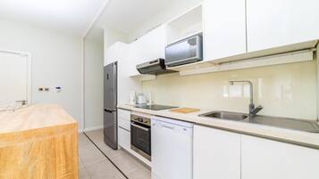 Apartment | Private kitchen | Fridge, microwave, oven, stovetop