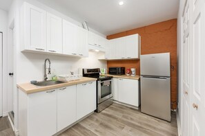 Fridge, microwave, oven, stovetop - #203_Downtown One Bedroom Loft in  with free parking (Montréal)